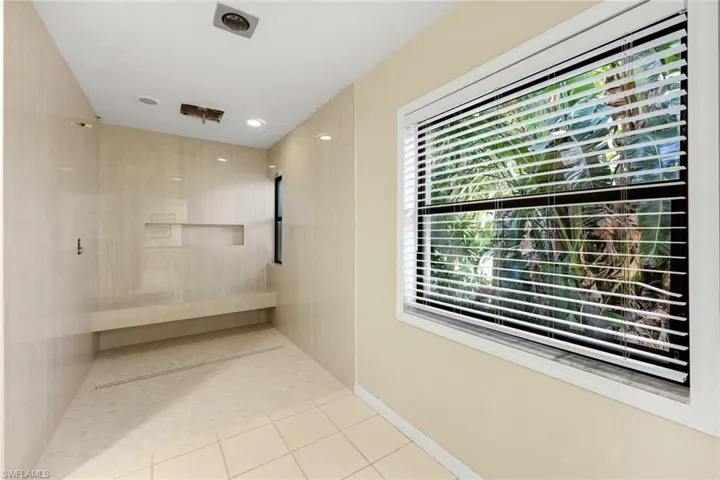 New and almost complete walk-in shower in owners suite