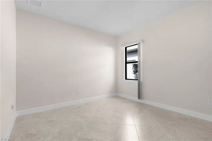 View of tiled empty room
