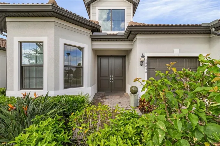 Entrance to property with a garage