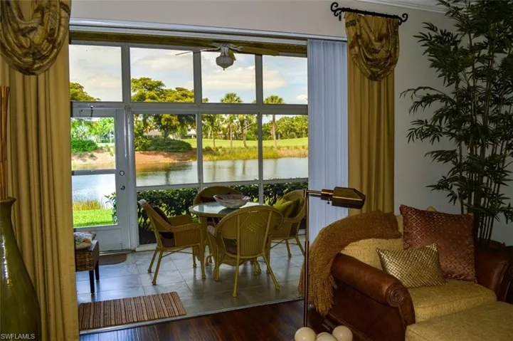 Sunroom with a water view