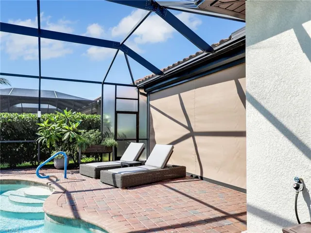 View of patio / terrace with a lanai