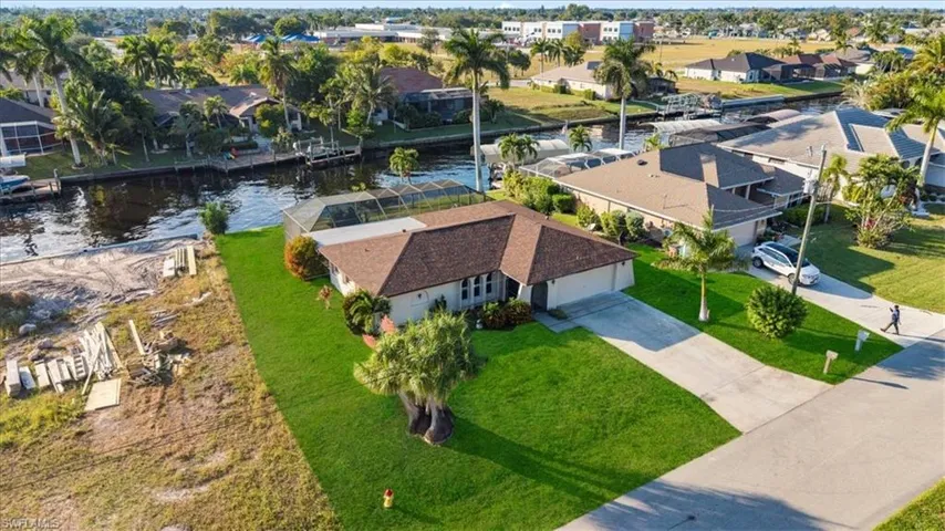 Aerial view of residential area with a nearby body of water