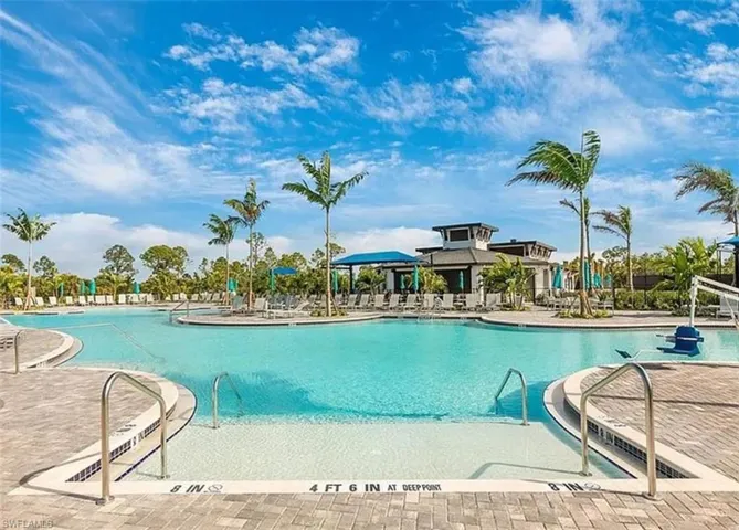 Community pool with a patio area