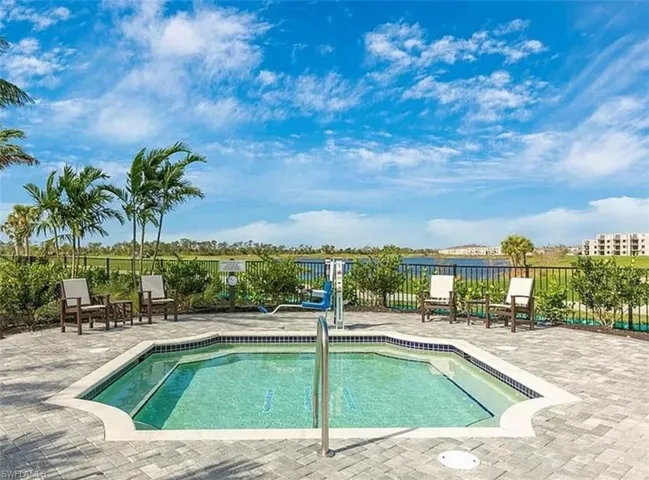 View of pool with a swimming pool and patio surround