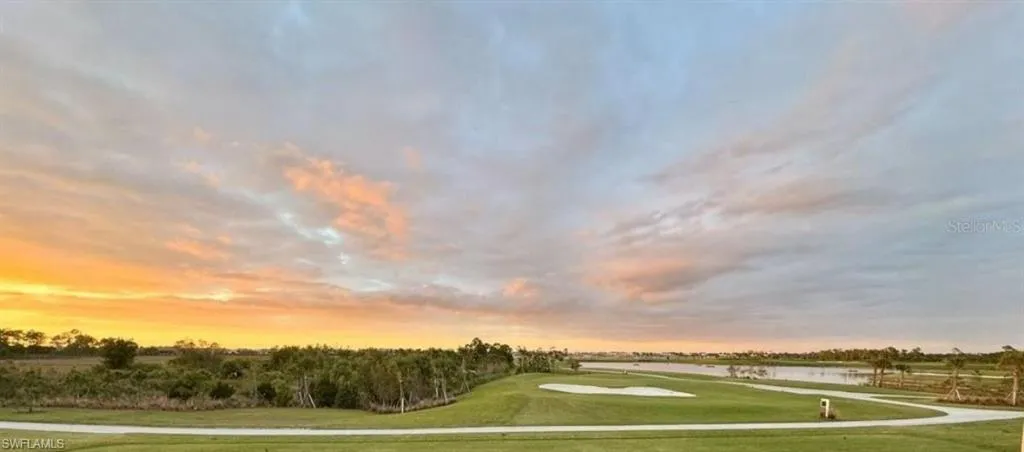 Surrounding community featuring view of golf course