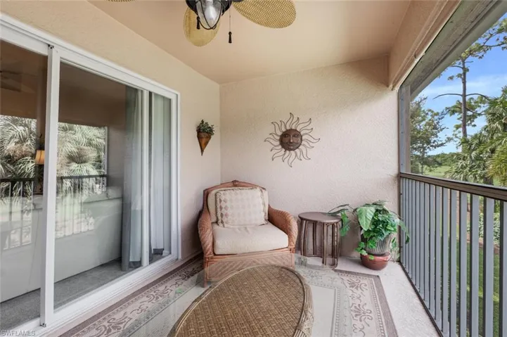 Balcony featuring a ceiling fan
