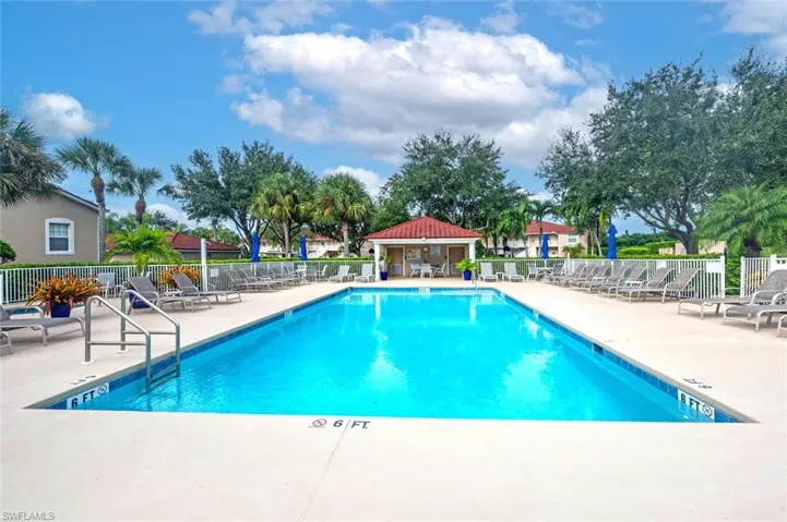 Community pool with a patio and a gazebo