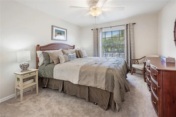 Bedroom featuring carpet flooring and ceiling fan