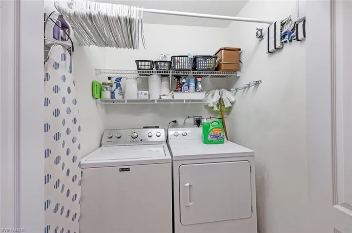 Washroom featuring separate washer and dryer