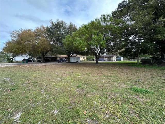 View of yard featuring a storage shed
