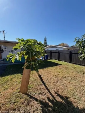 View of fenced backyard