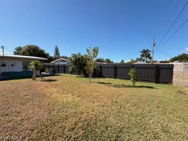View of fenced backyard