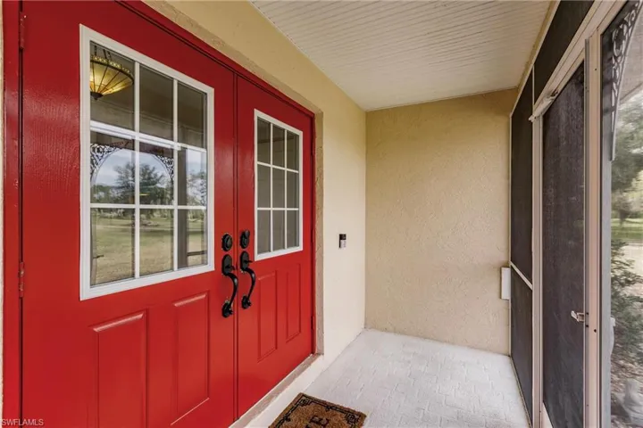 Property entrance with french doors