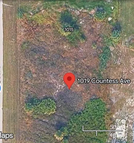 Aerial Map. Displaying the geographic location of the property with a specific address marker