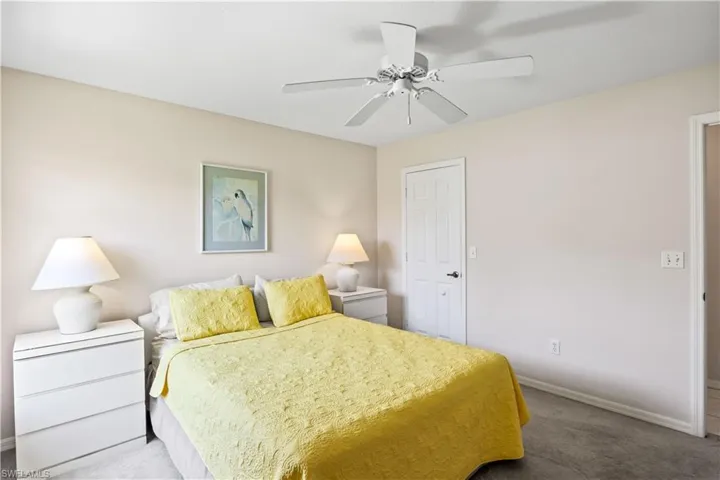 Bedroom with carpet flooring and ceiling fan