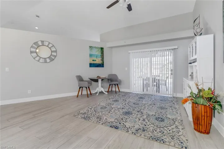 Dining room featuring light hardwood / wood-style flooring and ceiling fan