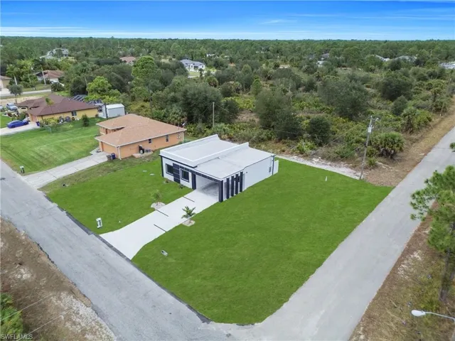 Aerial view of property and surrounding area