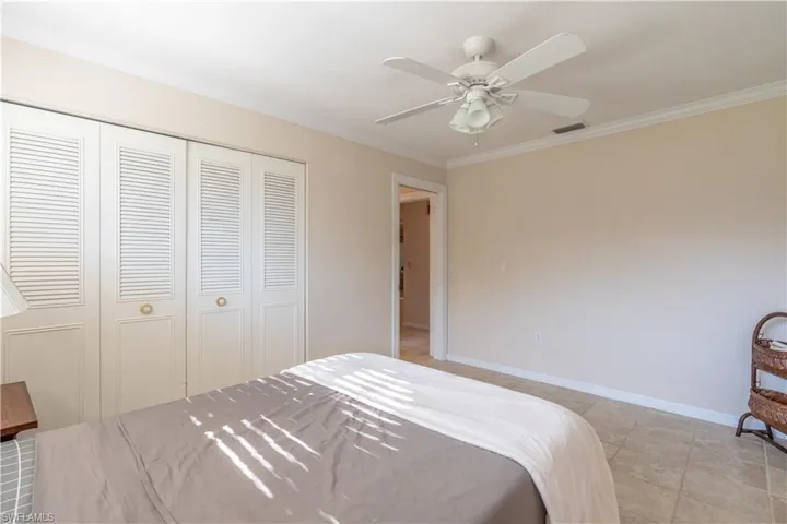 Spare room with ceiling fan