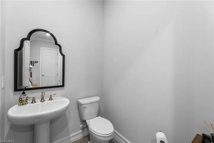 Powder room next to mud room