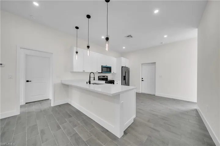 707 Randall Ave E, Lehigh Acres, Florida 33974