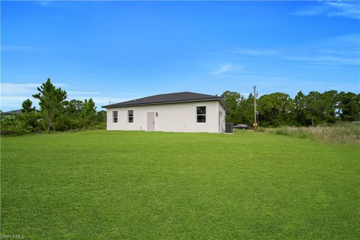 707 Randall Ave E, Lehigh Acres, Florida 33974