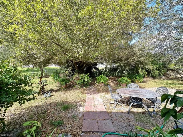 View of yard with a patio