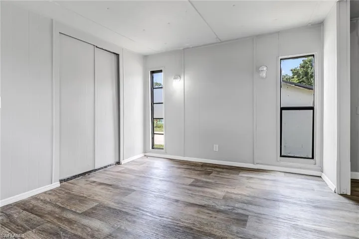 Spare room with hardwood / wood-style floors