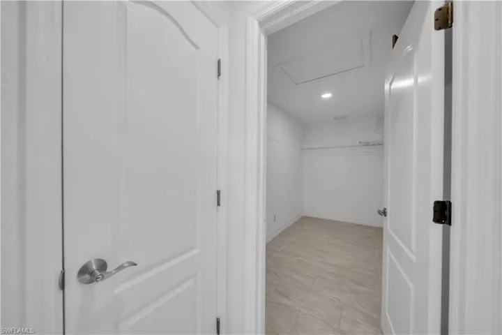 Spacious closet with attic access