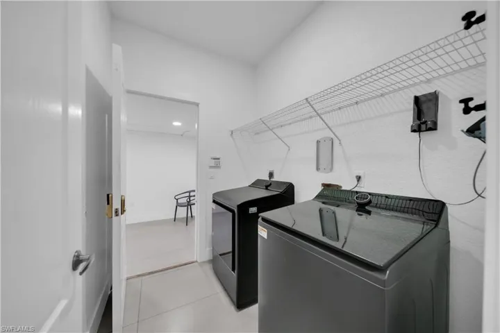 Washroom with separate washer and dryer