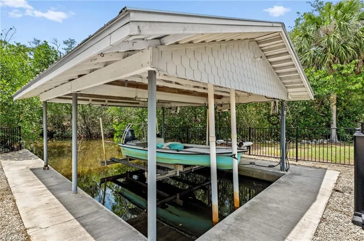 Dock area featuring boat lift