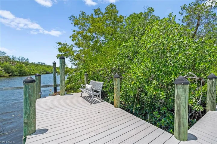 Dock featuring a water view