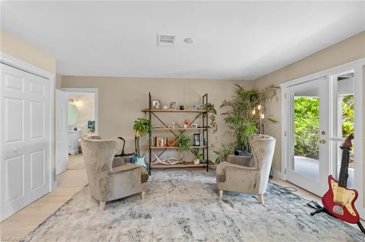 Sitting room with wood finished floors