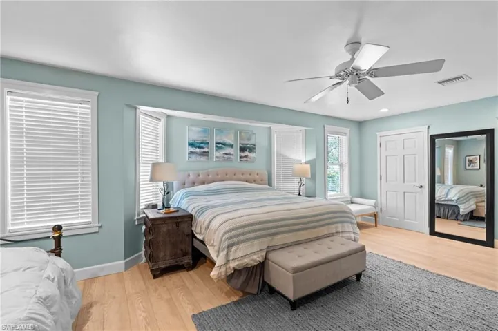 Bedroom featuring light wood finished floors and ceiling fan