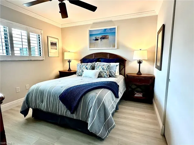 The 12' X 11' guest bedroom has an oversized clothes closet, plantation shutters and a cozy feel