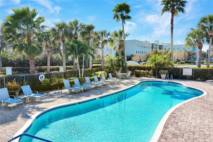 Community pool featuring a patio area