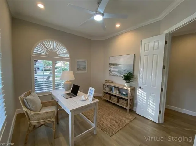 Home office with a ceiling fan, wood finished floors, recessed lighting, and ornamental molding