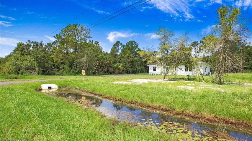 View of yard featuring a water view
