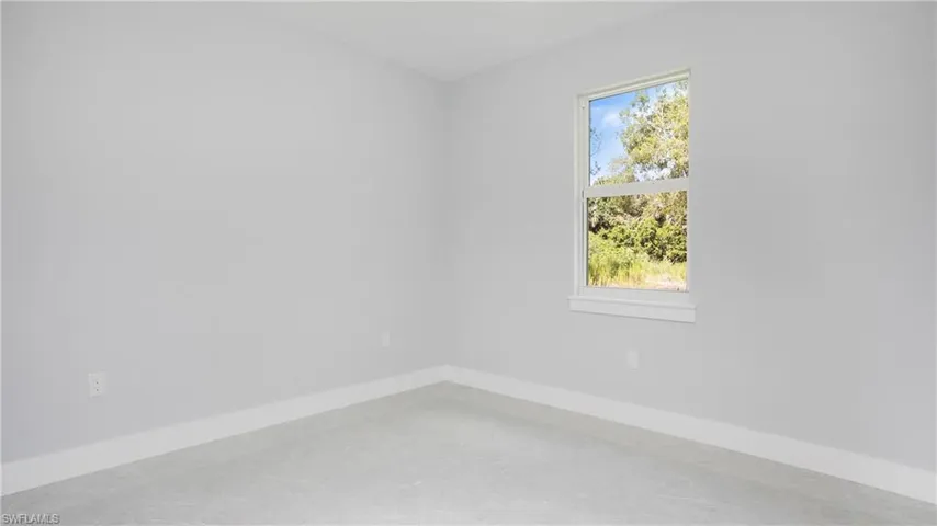Spare room with baseboards