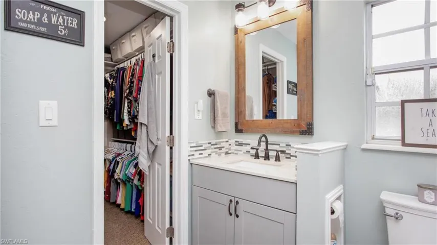 Bathroom with vanity and toilet