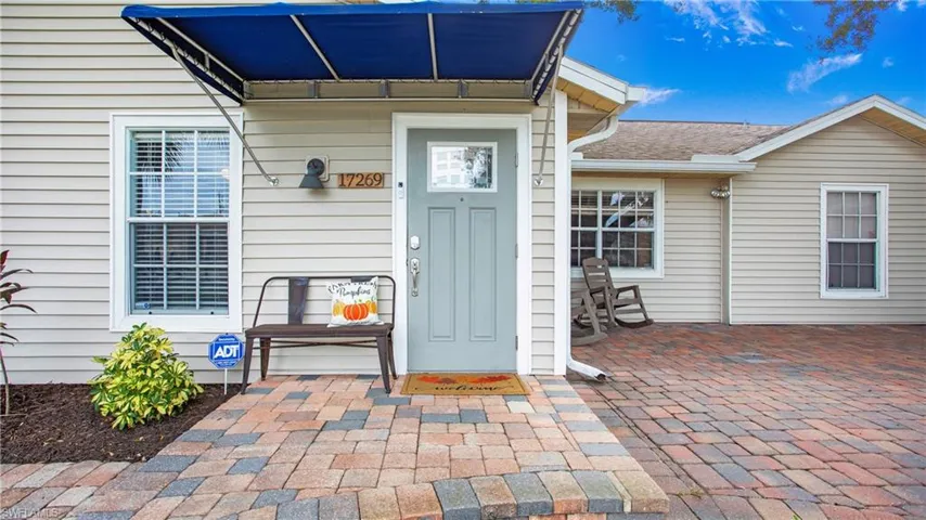 Entrance to property with a patio area