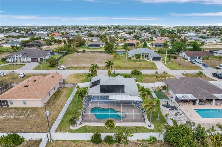 Birds eye view of property with a residential view