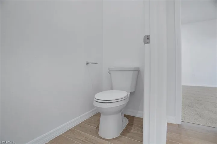 Bathroom featuring wood tiled floors