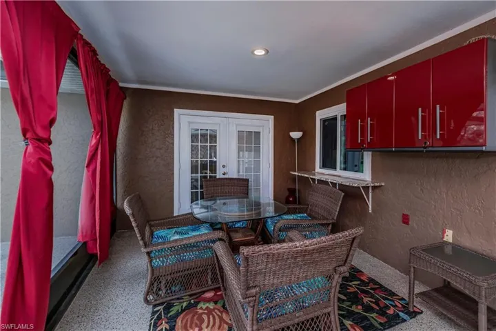 Patio space featuring french doors and ornamental molding