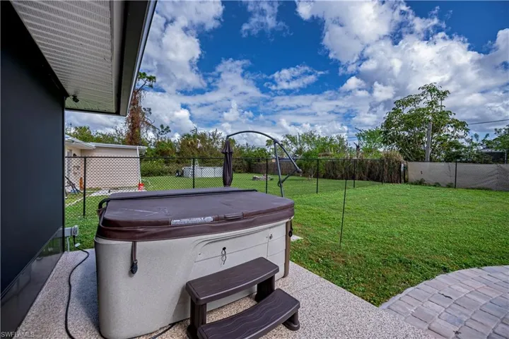 View of yard featuring a hot tub