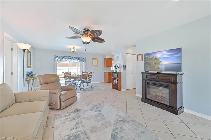 Tiled living room with ceiling fan