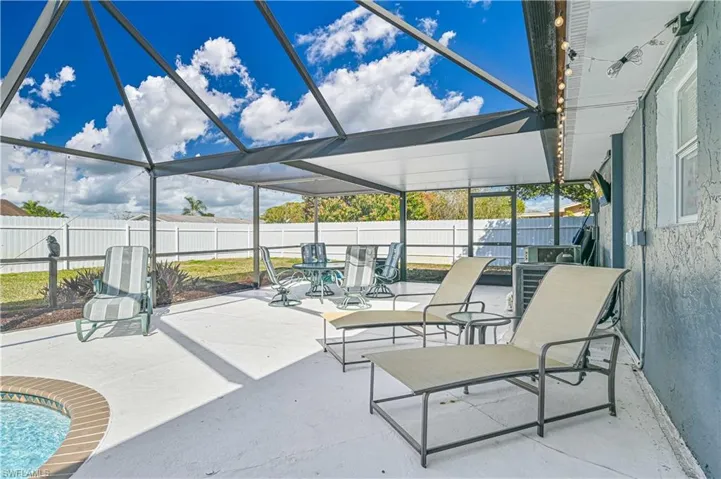 View of patio / terrace with a lanai