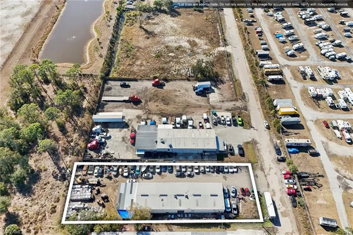 Aerial view of property's location with a nearby body of water