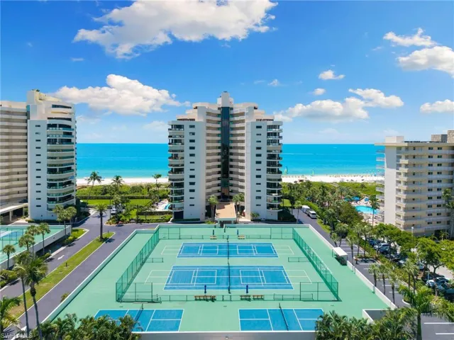 View of tennis /Pickleball court with view of the gulf and beautiful Marco Island beach