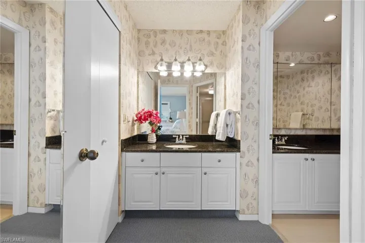 Master Bathroom with separate ensuite, vanity with double sinks.