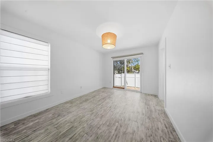 Empty room featuring light wood finished floors